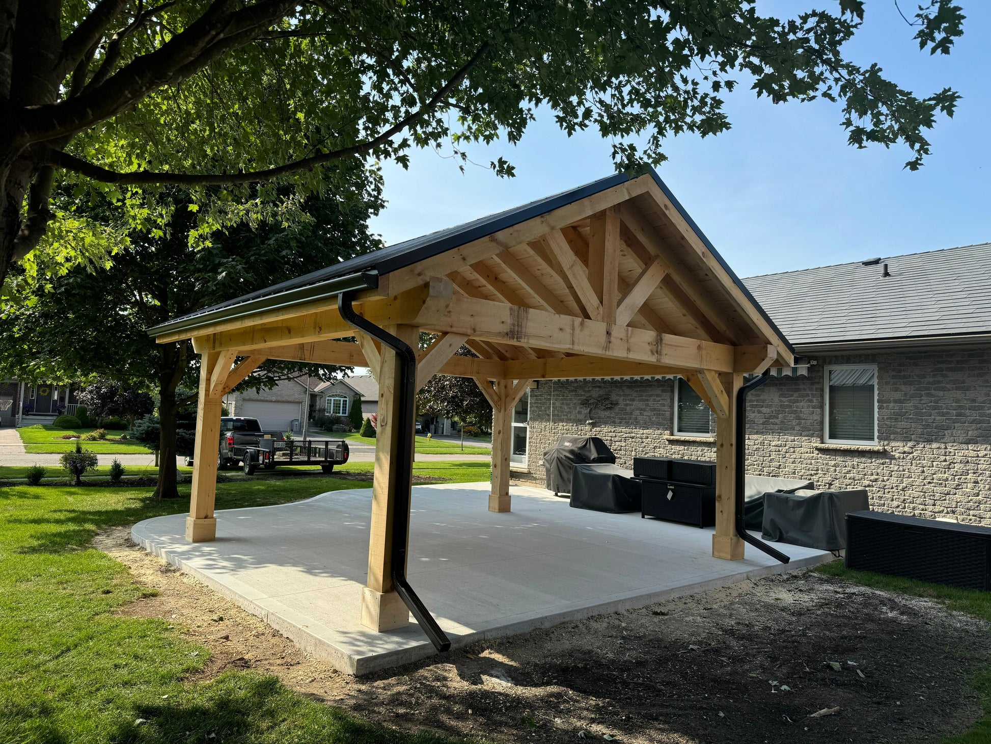 A-frame timber pavilion backyard