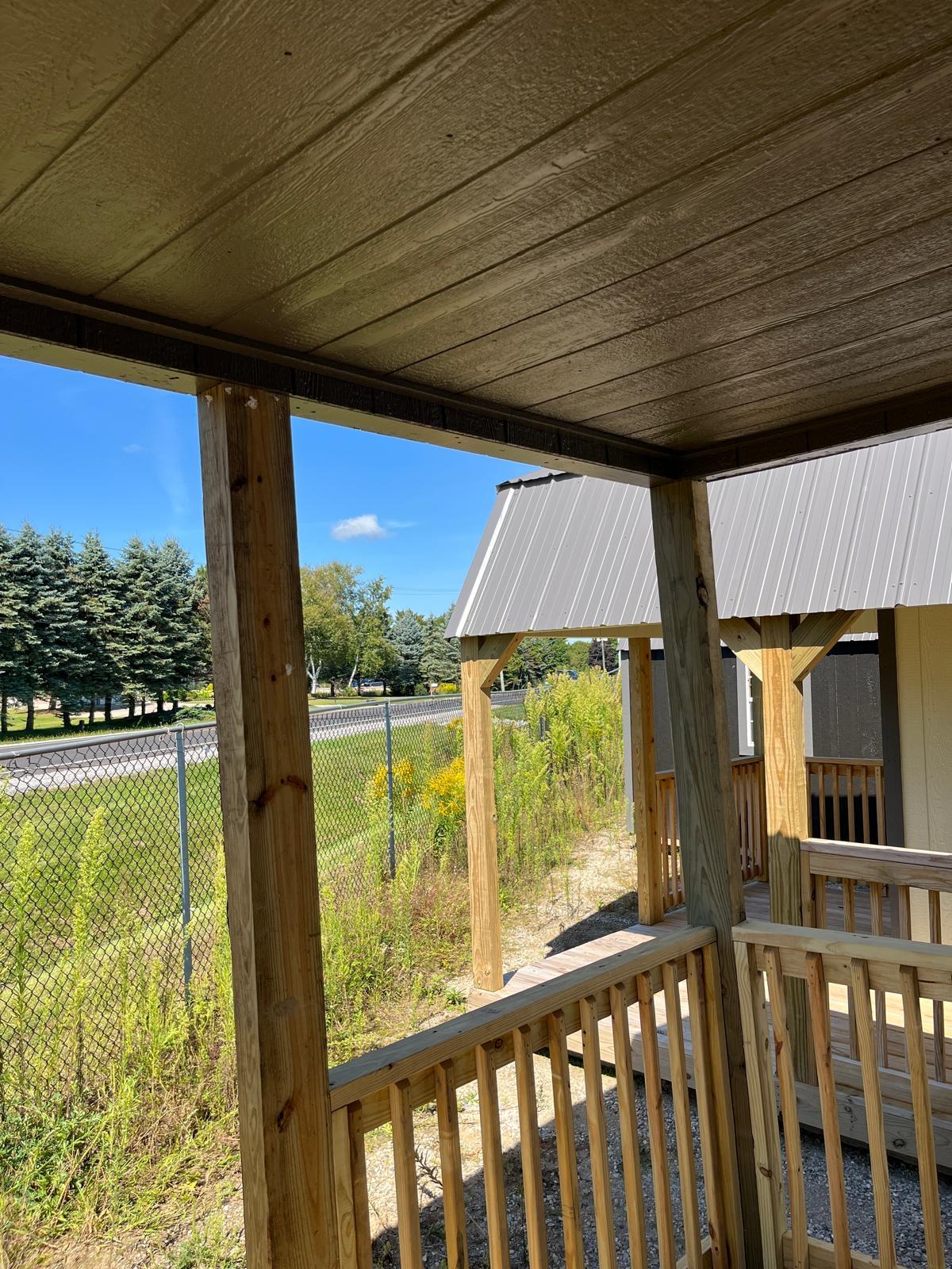 backyard cabin with porch