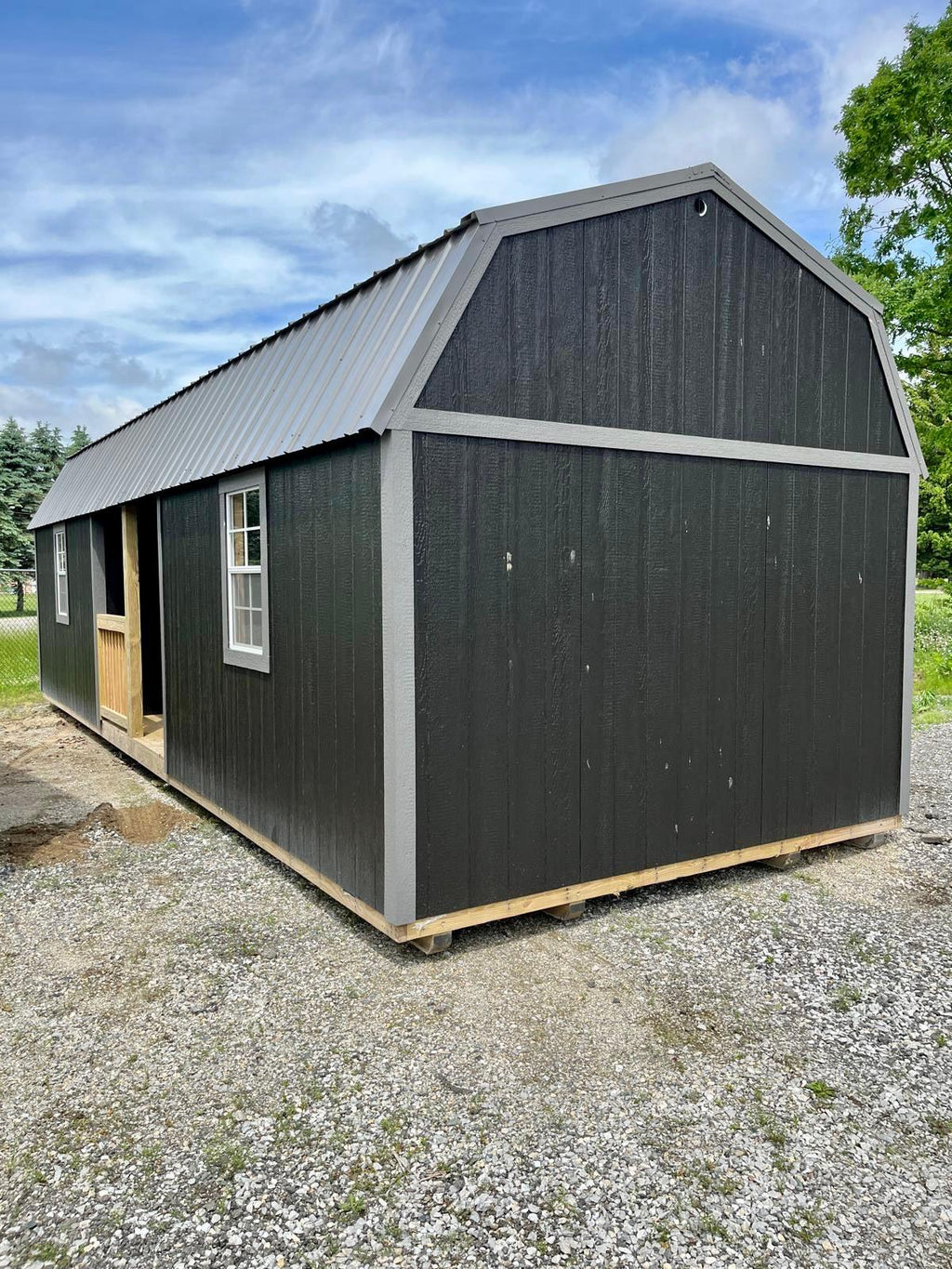 portable lofted barn bunkie cabin with porch black 