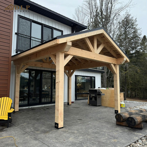 A-frame timber pavilion at cottage