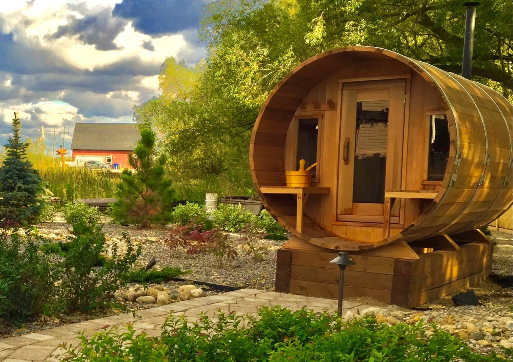 red cedar barrel sauna in nature