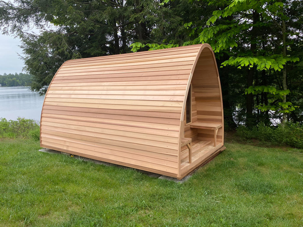 red cedar pod sauna with porch at lake 