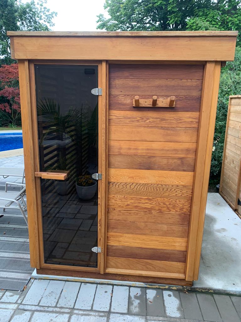 Pure cube 550 sauna with solid front wall