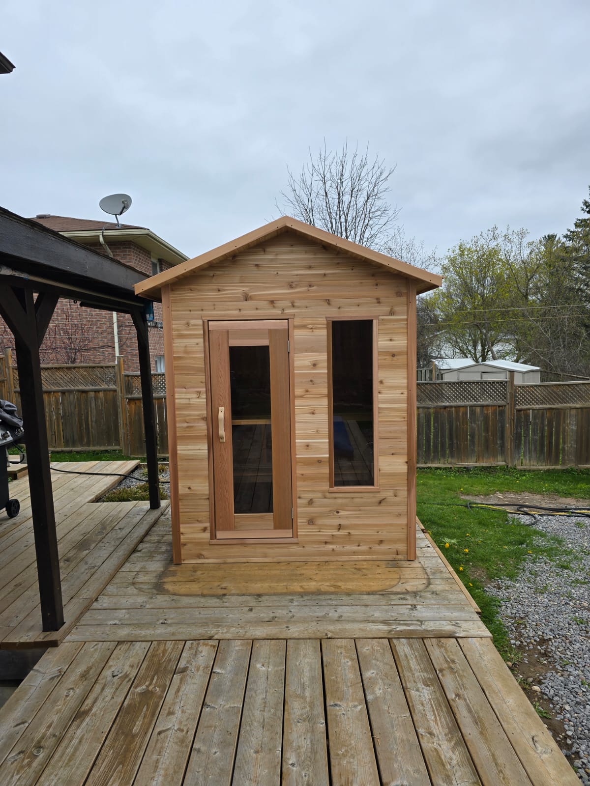 red cedar cabin sauna on porch