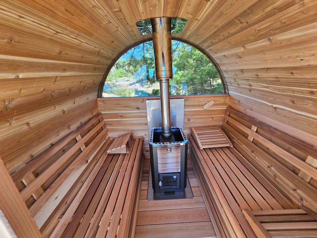 red cedar barrel sauna with wood heater