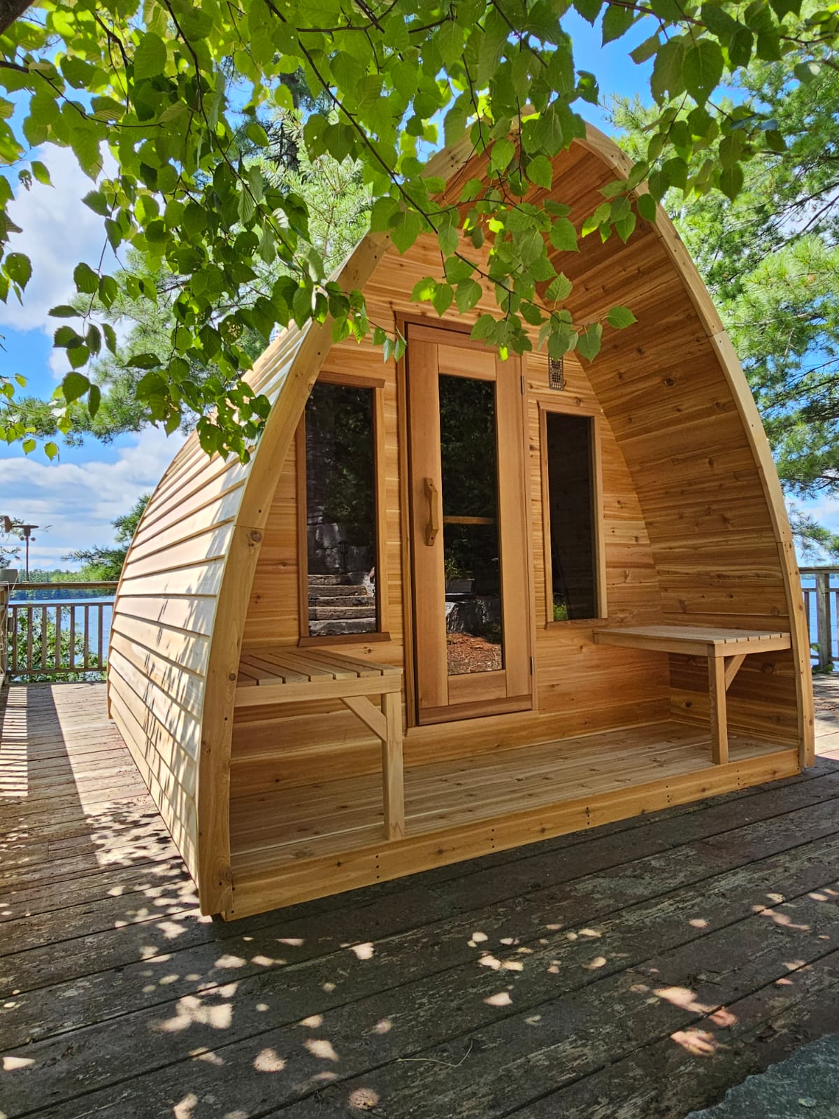 red cedar pod sauna on porch