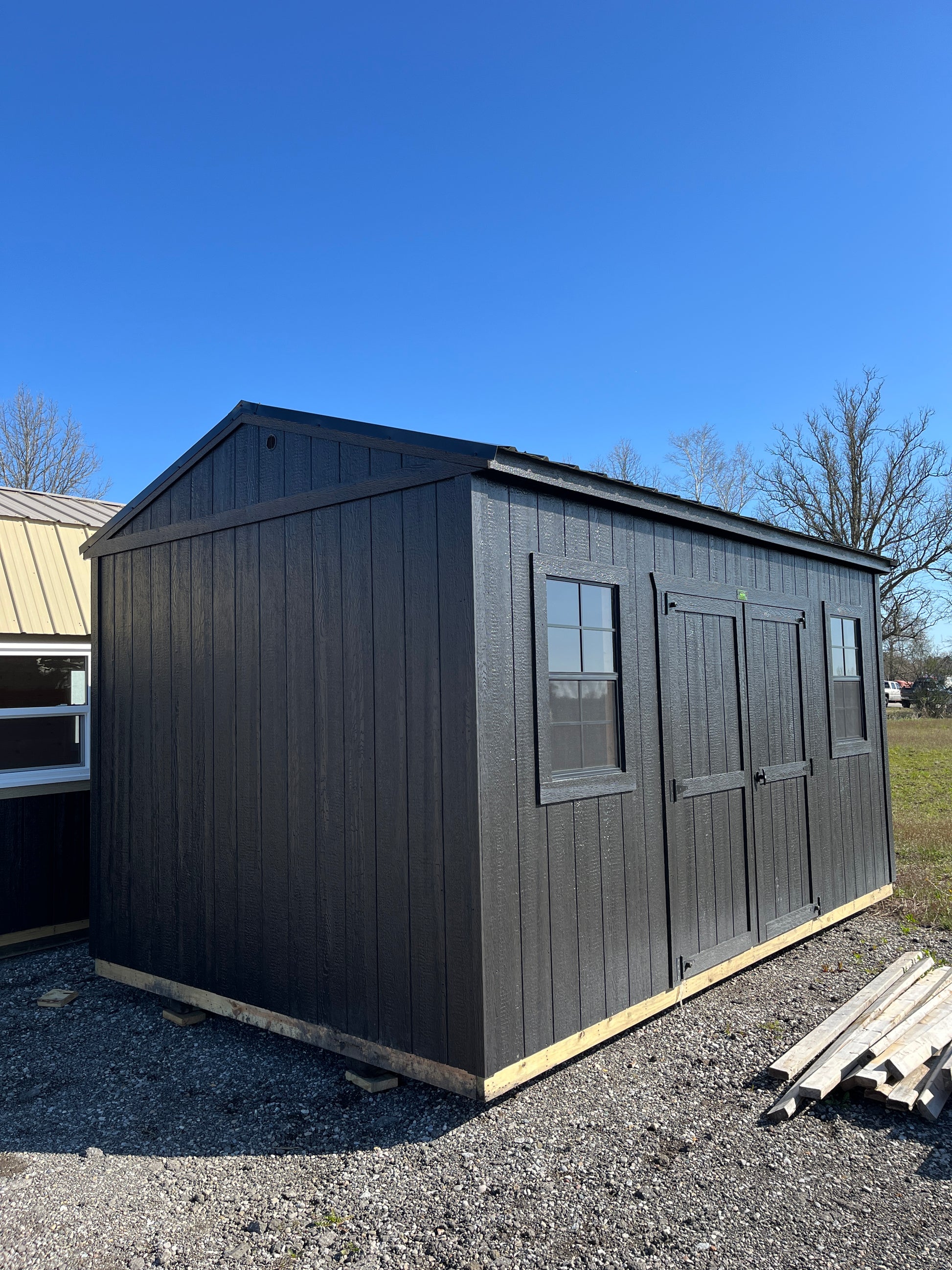 portable side utility storage shed blacked out