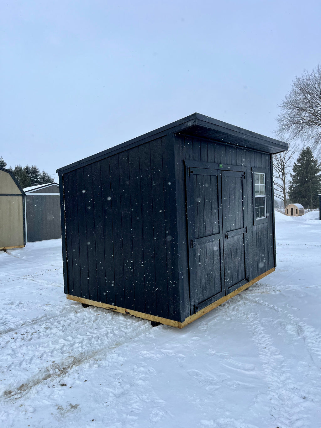 cottage shed pool storage blacked out