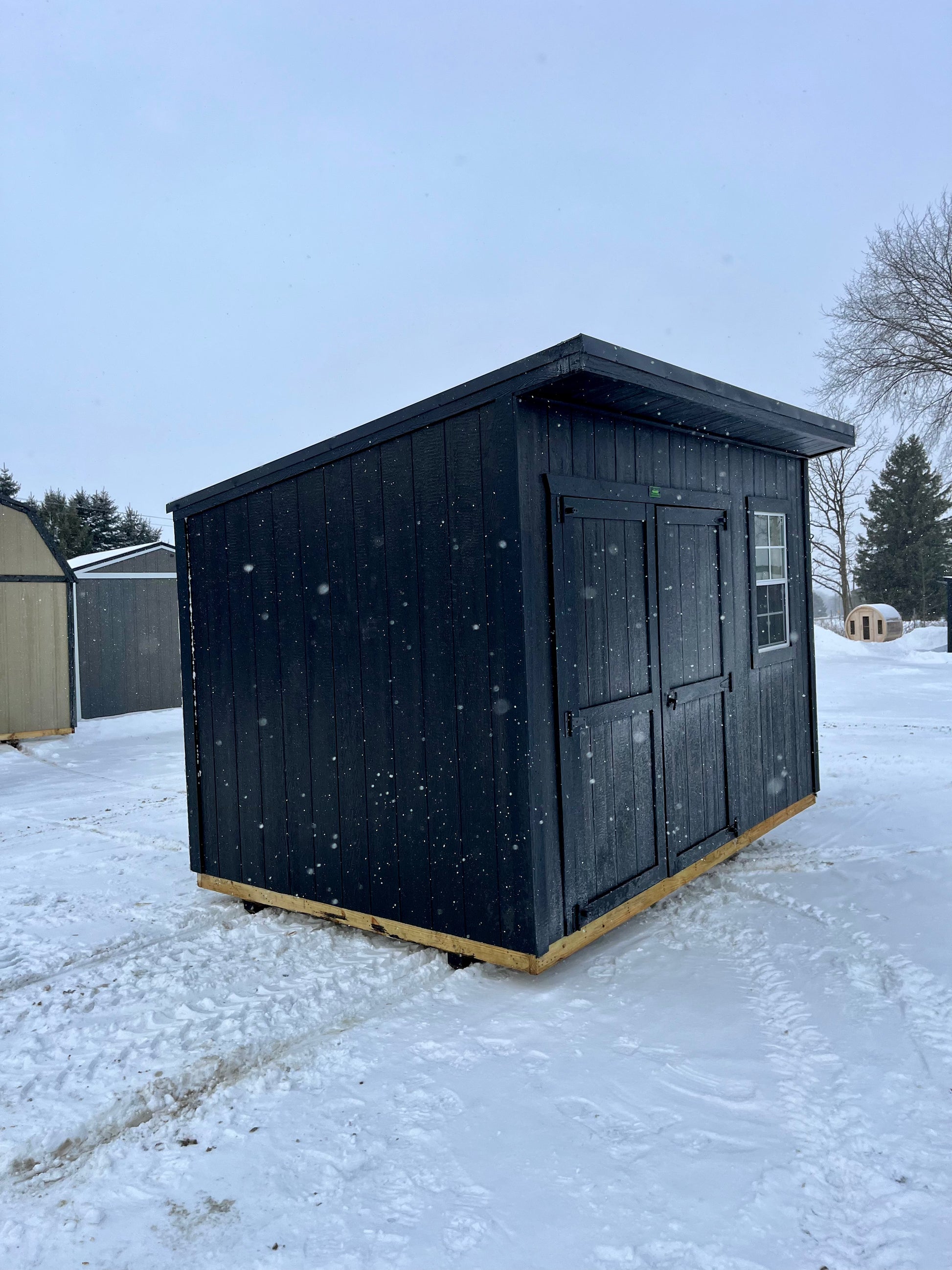 cottage shed pool storage blacked out