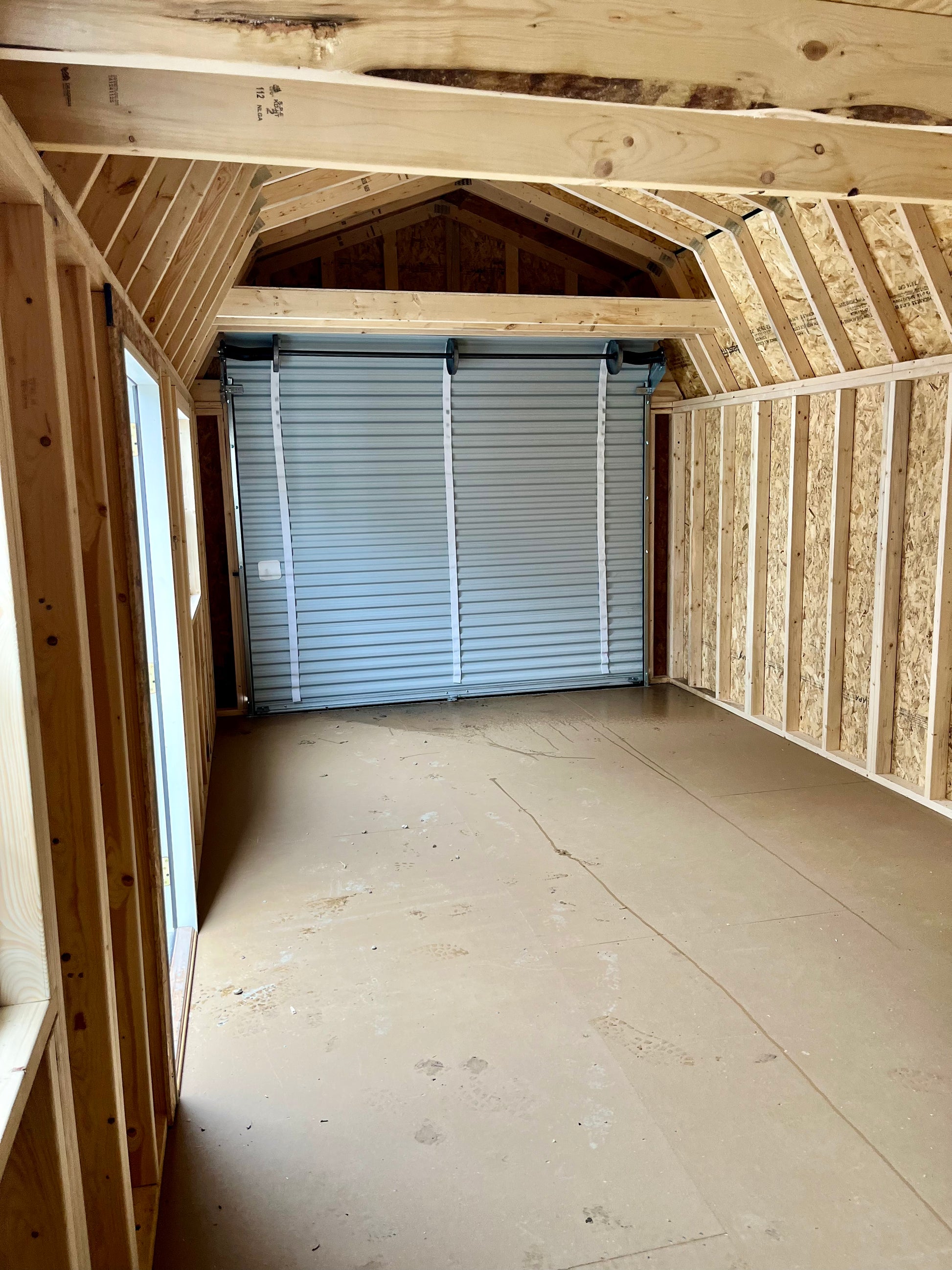 portable lofted barn storage garage interior rollup door
