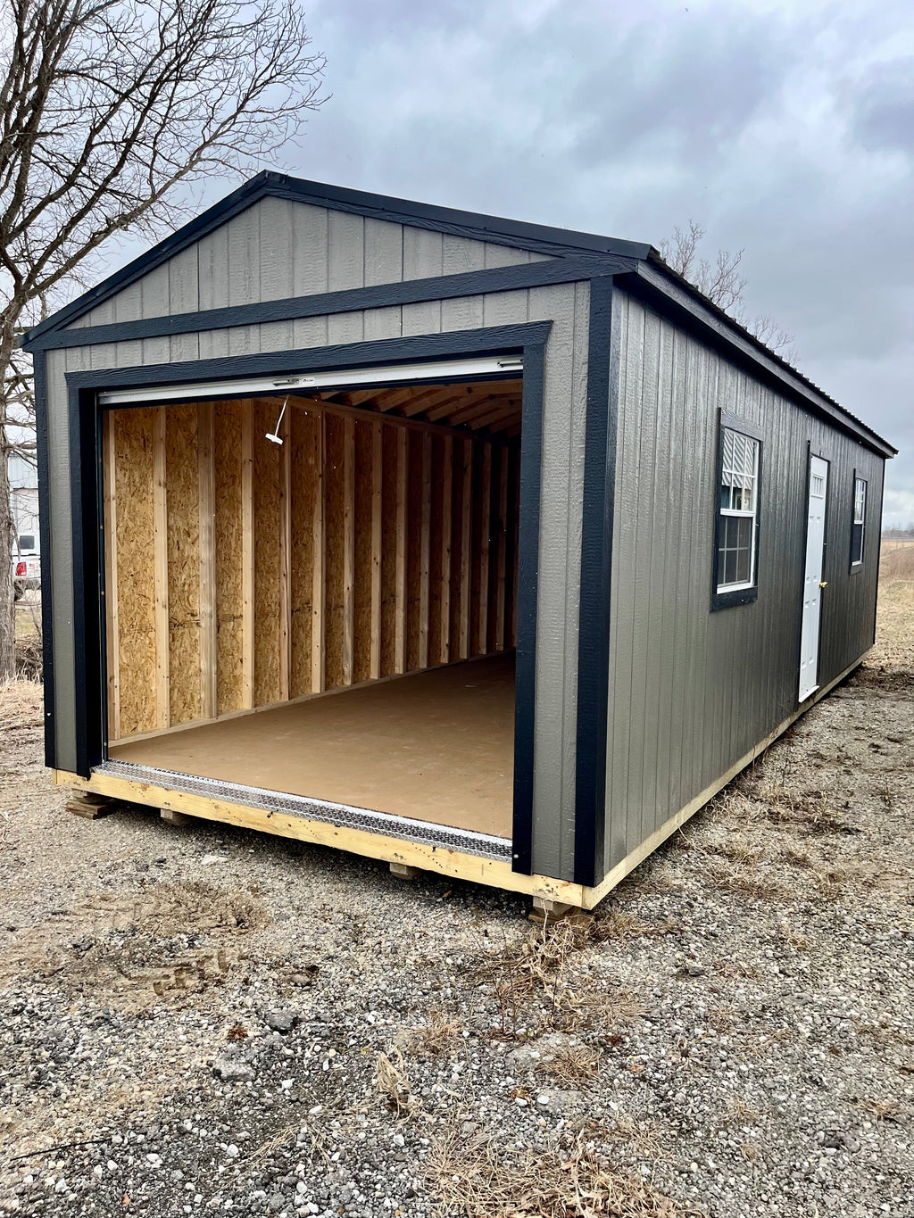 portable garage shed rollup door