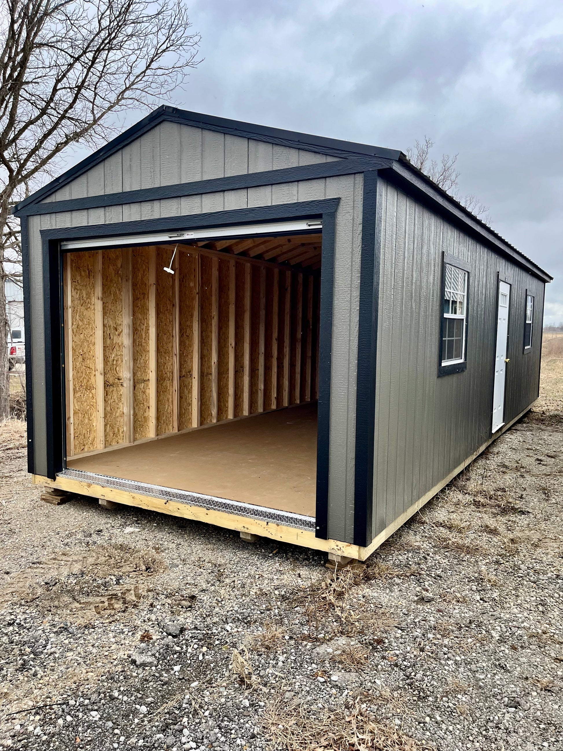 portable garage shed rollup door