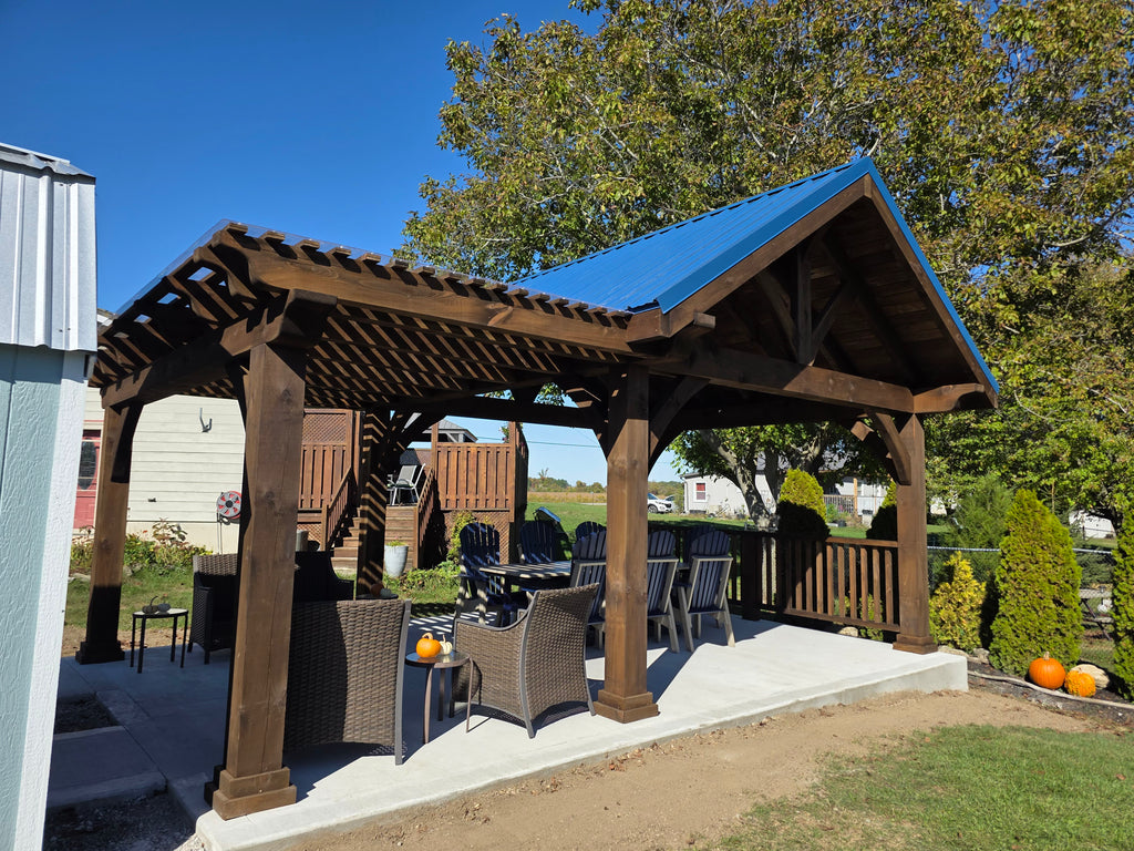 Wooden gazebo with outdoor furniture on a sunny day