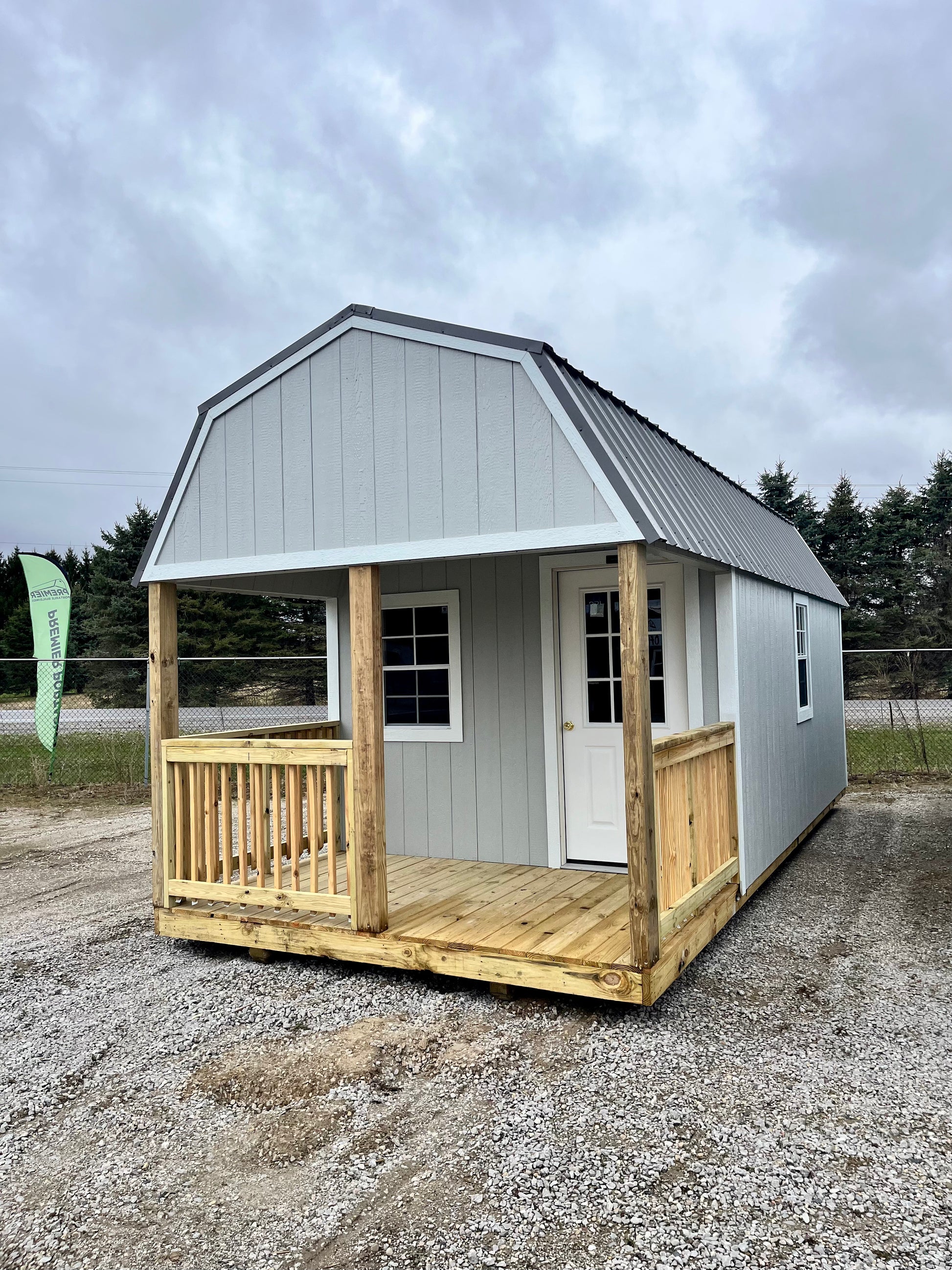 portable lofted barn cabin bunkie with porch windows