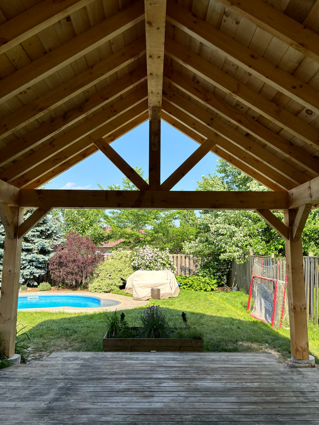 A-frame timber pavilion rough cut beams