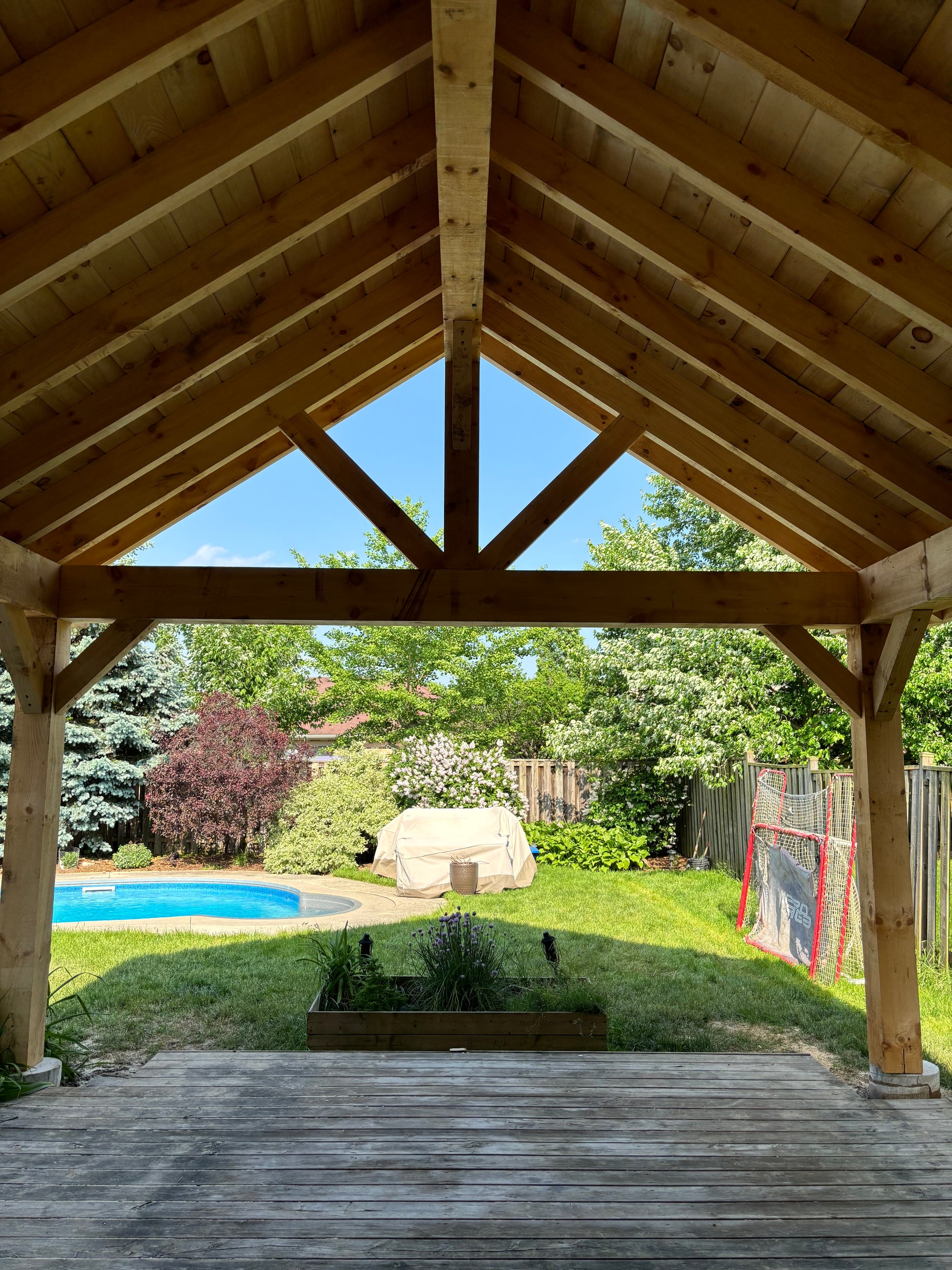 A-frame timber pavilion rough cut beams