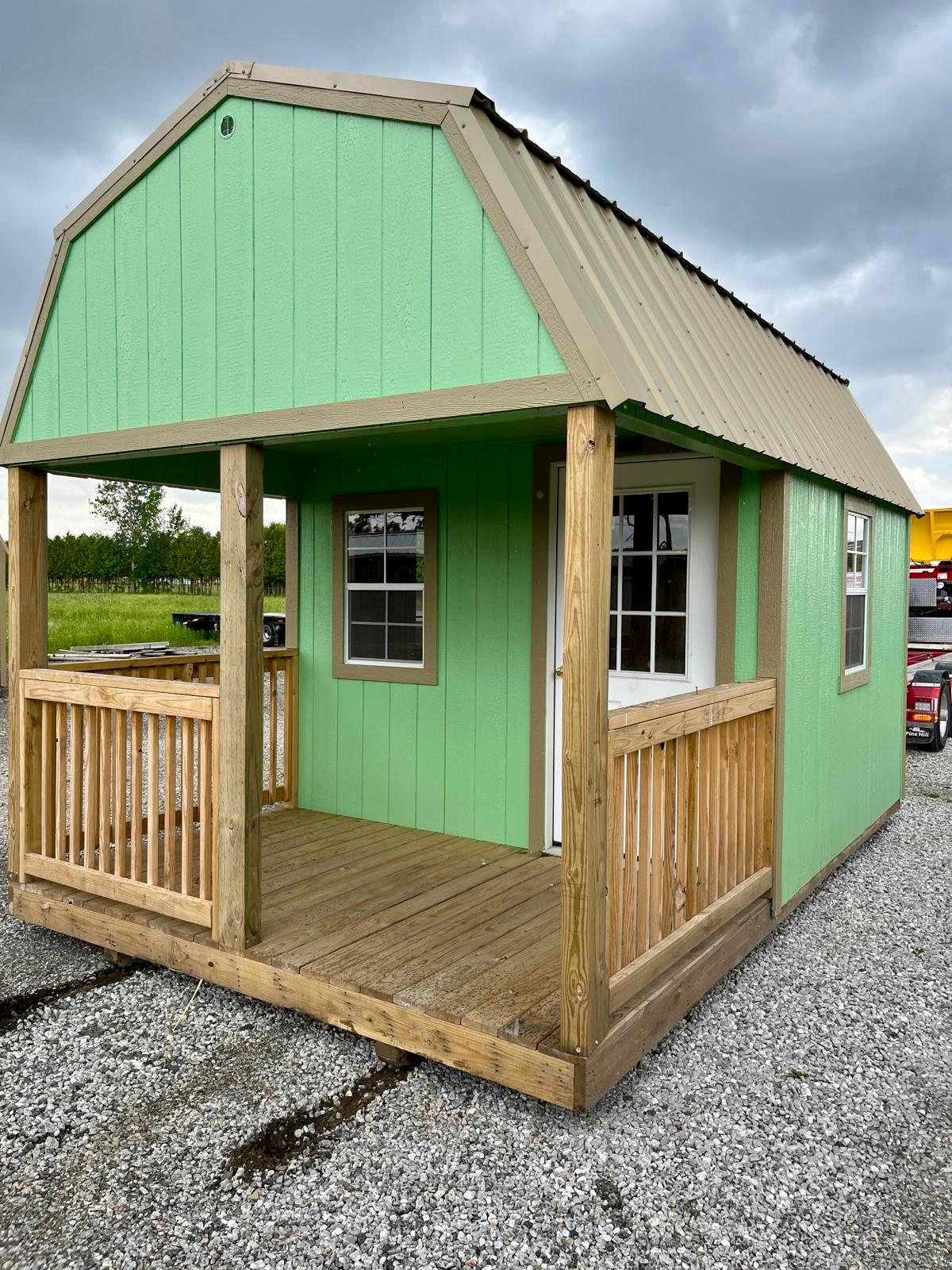 portable lofted barn cabin bunkie with porch green