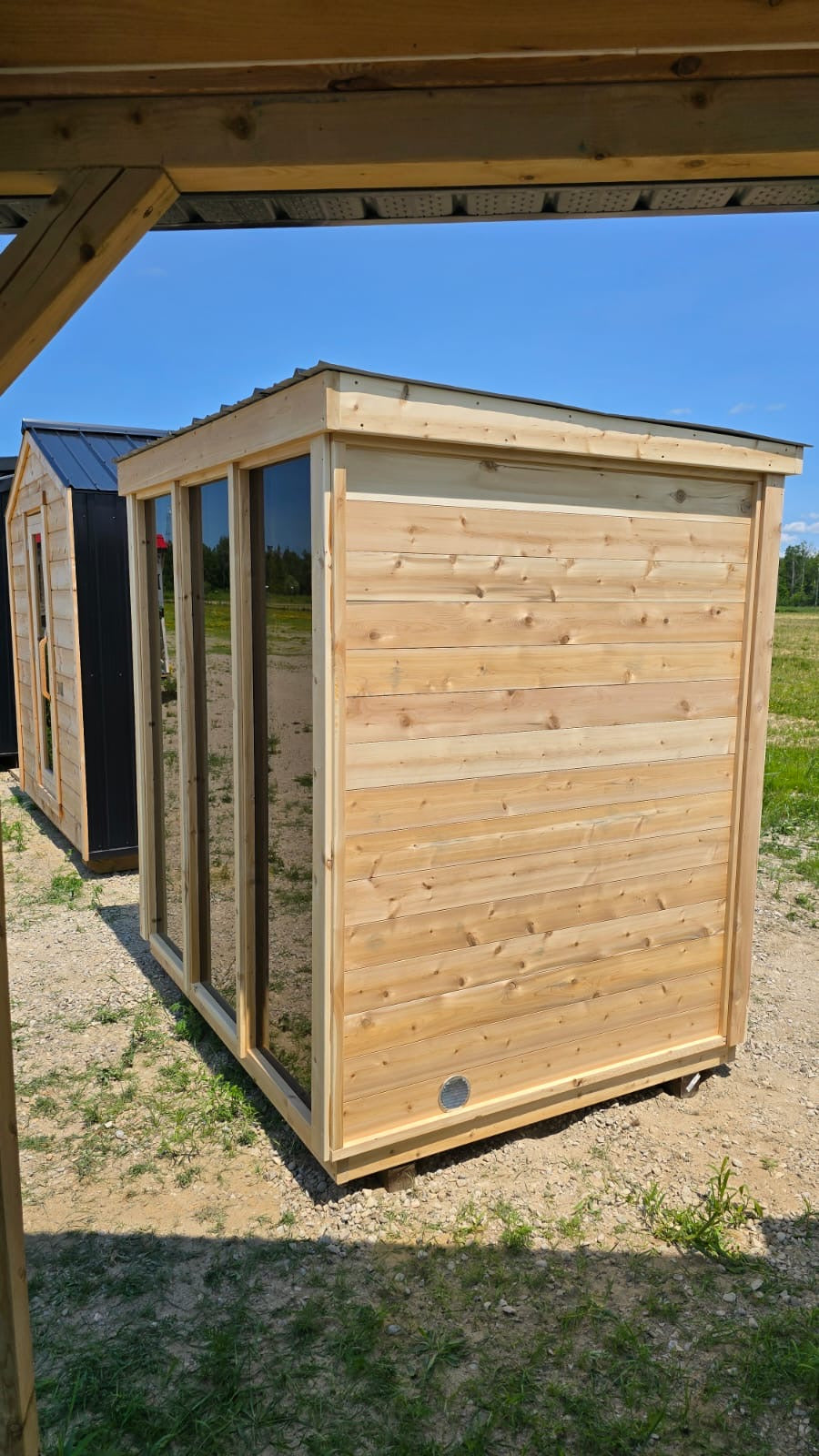 white cedar sauna glass front wood siding